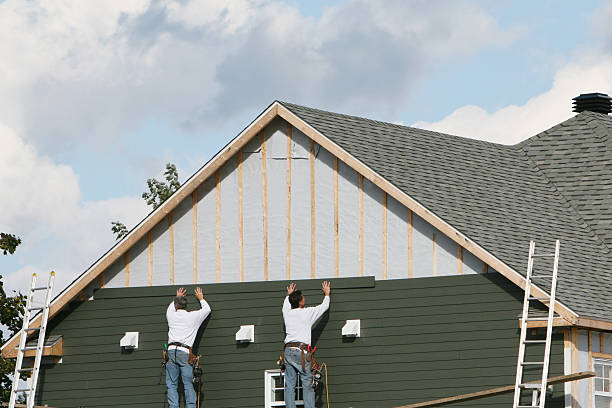 Professional Siding technician working in Lykens, PA